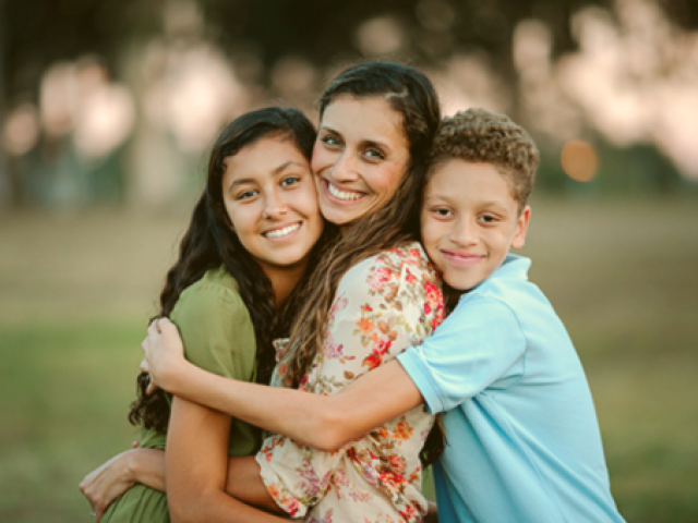 A daughter, mom and son